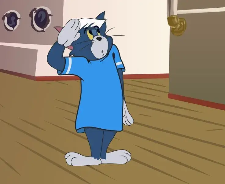 Hình chế mèo Tom dáng ngồi suy tư sâu xa