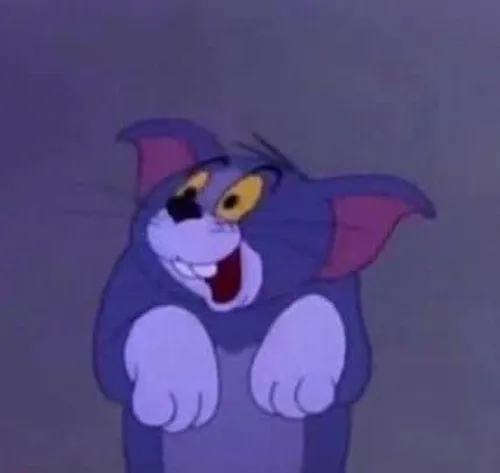 Meme Tom biểu cảm mắt lồi khi trượt chân vào cửa sổ