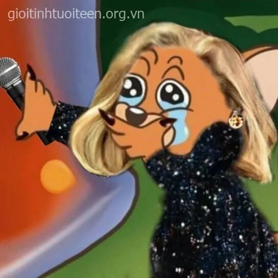 Meme chuột Jerry bịt miệng khóc ấm ức nhìn cực đáng thương.