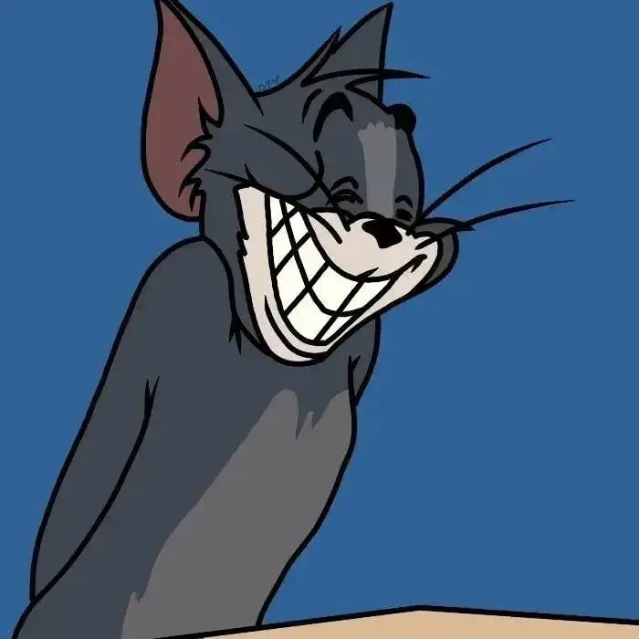 Mèo Tom gượng gạo làm nụ cười trở nên gượng ép