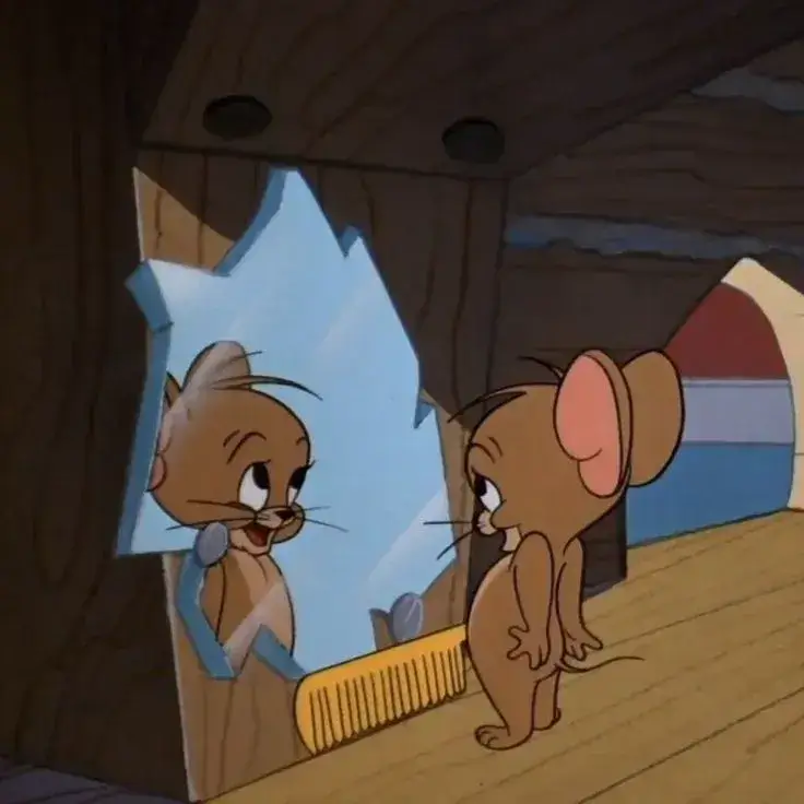 Meme chế biểu cảm Jerry cười đắc ý và lanh lợi