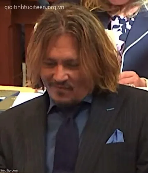 Meme cười nham hiểm, gương mặt đầy sự thách thức.