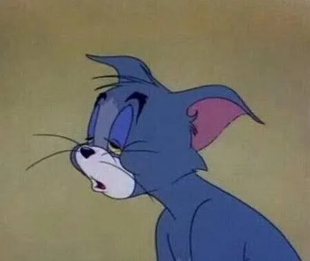 Mèo Tom buồn ngủ mắt mở ko ra