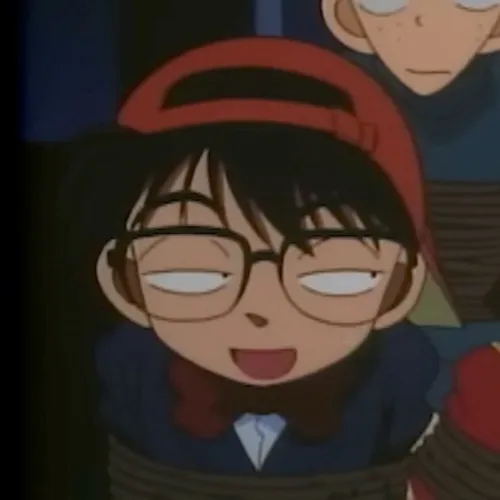 Meme Conan nhìn ra cửa sổ suy tư trong ánh chiều