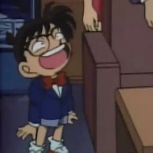 Ảnh hài Conan giơ kính lên kiểm tra dấu vân tay