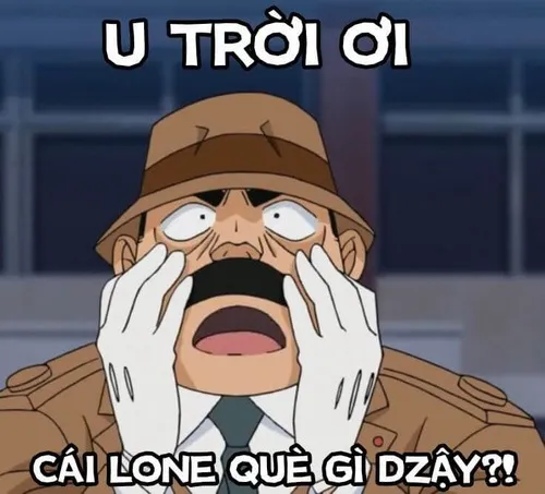 Meme Conan cầm kính soi dấu vết tại hiện trường