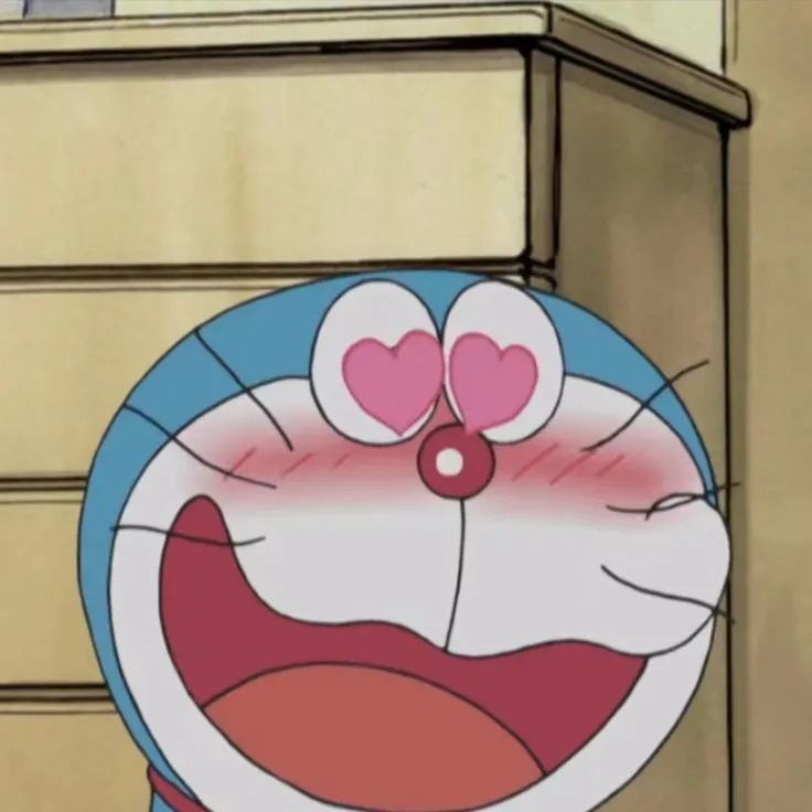 Hình chế meme vui Doraemon giơ nắm tay tuyên bố “đời vẫn vui”