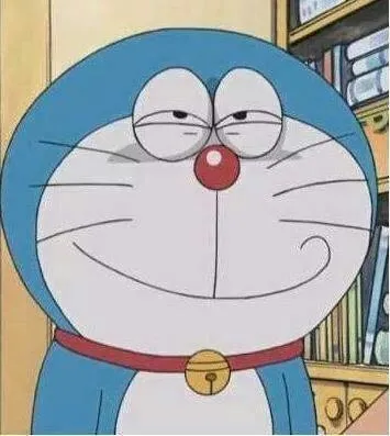 Hình chế meme vui Doraemon xoa đầu Nobita an ủi sau khi bị điểm kém