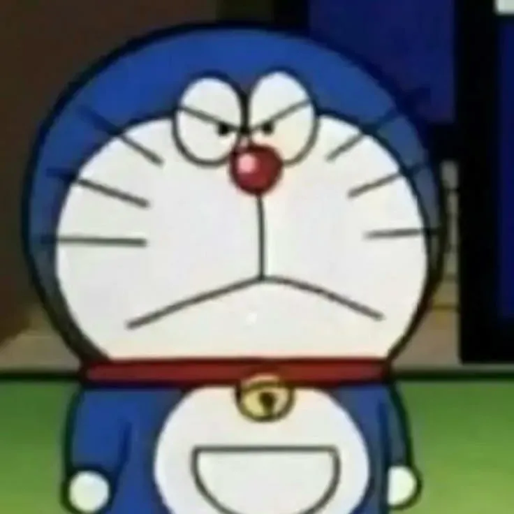 Meme hài Doraemon đội nón che mưa khi Shizuka đi ngang