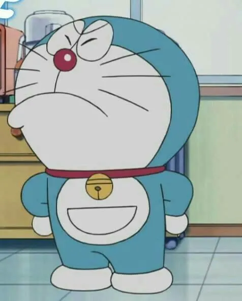Ảnh vui Doraemon cầm bánh rán run run như bảo vật vô giá