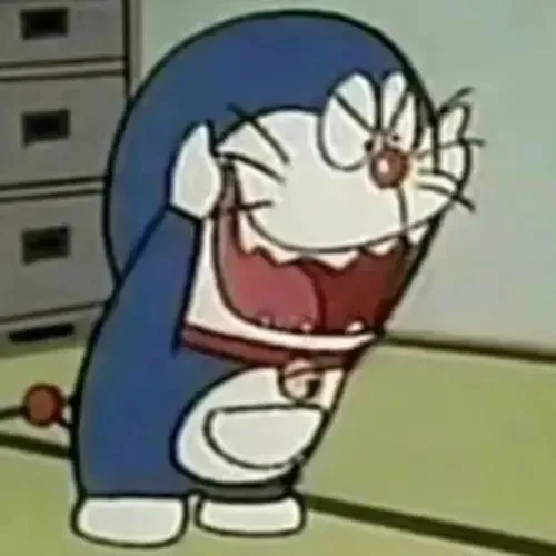 Ảnh meme vui Doraemon cười khúc khích khi Xeko té ngã trước cổng