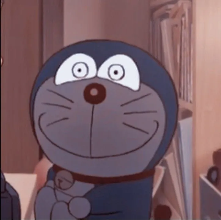 Meme Doraemon tròn mắt ngạc nhiên khi bảo bối phát sáng bất ngờ